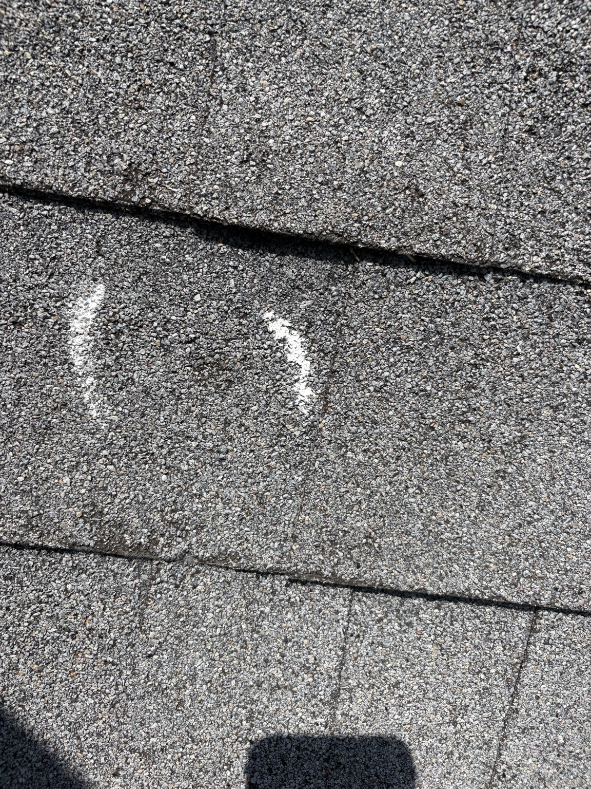Hail impact marking on shingle